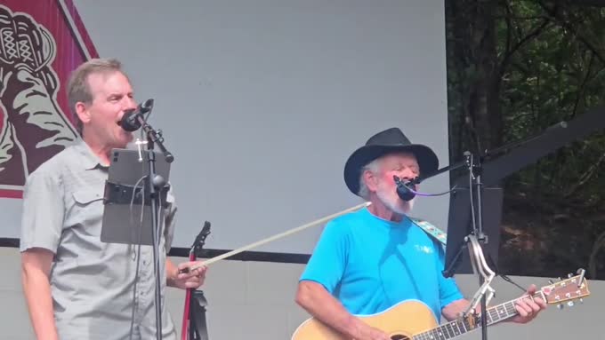 Guitar and fiddle trading a line